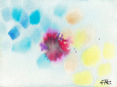 Abstract watercolor painting with a burst of color in the middle, with dabs of blue and yellow paint in the background